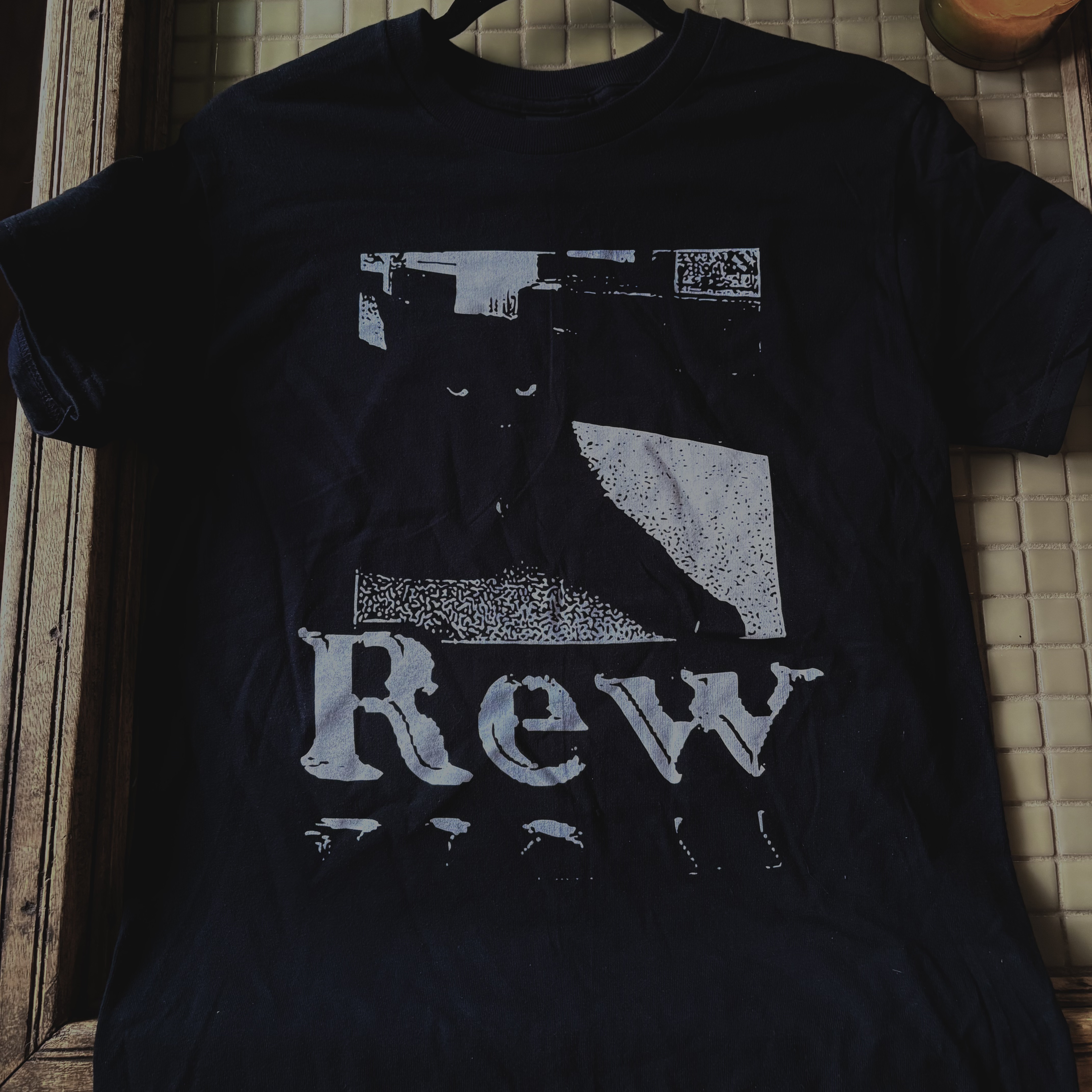 rew cat shirt detail